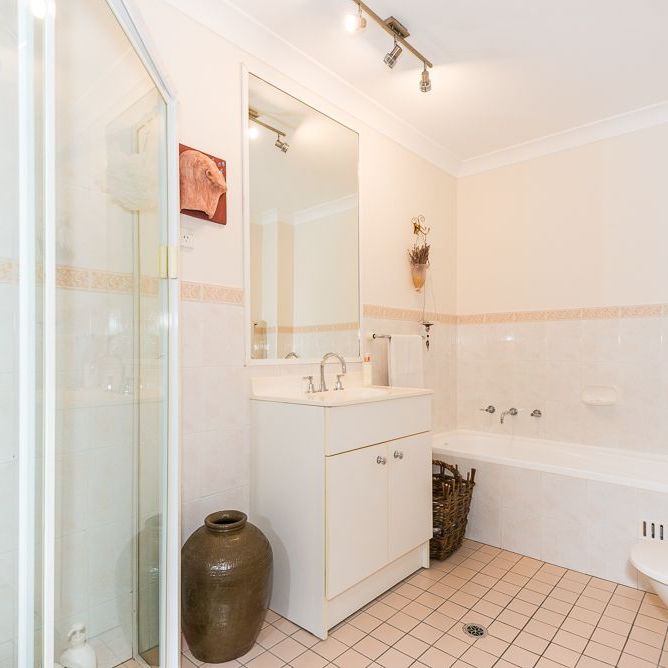 Tranquil Top-Floor Apartment with Leafy Outlook - Photo 1