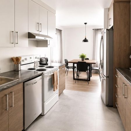 🏡 Grand 4½ lumineux avec plancher chauffant et climatiseur - Photo 3