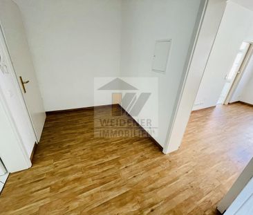 Untermhaus! Schicke 2 Zimmer Wohnung mit Balkon und großem Mietergarten! - Photo 1