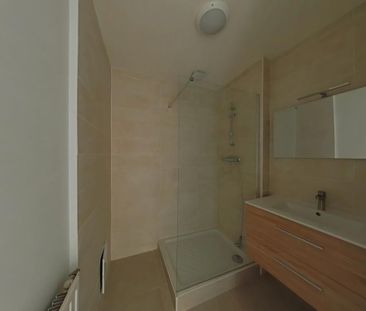 Location Appartement 3 pièces 59m² ROMANS SUR ISERE 26100 - Photo 4