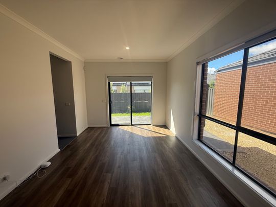Modern Four-Bedroom Home with Contemporary Brick Features & Double Garage - Photo 1