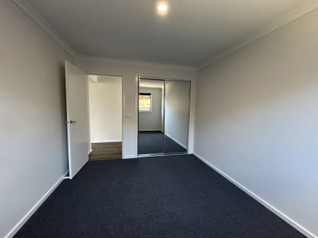 BRAND NEW FOUR BEDROOM HOME - LOW MAINTENANCE! - Photo 3