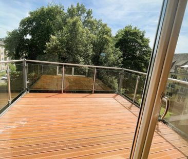 Offen gestaltete DG-Wohnung mit herrlichem Ausblick und Einbauküche! - Foto 3