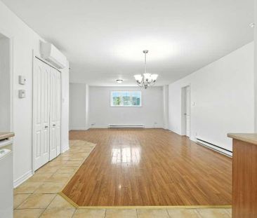 TRÈS GRAND APPARTEMENT 5 1/2 DE +- 1365 PI.CA AVEC THERMOPOMPE À LO... - Photo 2