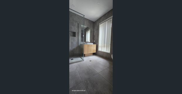 Modern 4 Bedroom Home with Quality Finishes! - Photo 1