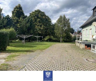 Individuelle Dachwohnung mit EBK, Laminat und Wannenbad! Grüne Umge... - Foto 1