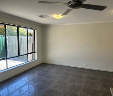 Modern Low Maintenance 3 Bedroom Home – Perfect for the Family! - Photo 2