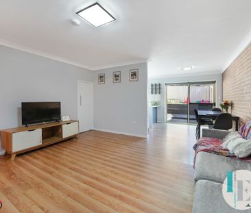 Immaculate Two-Bedroom Townhouse in Prime but Peaceful Location - Photo 4
