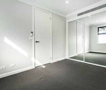 Low maintenance, modern living - Photo 2