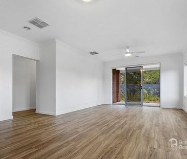 BEAUTIFULLY APPOINTED FOUR-BEDROOM FAMILY HOME WITH TWO LIVING AREAS - Photo 2