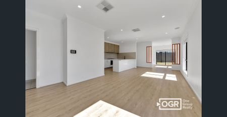 Discover Modern Elegance and Family Comfort in the Heart of Wollert! - Photo 3