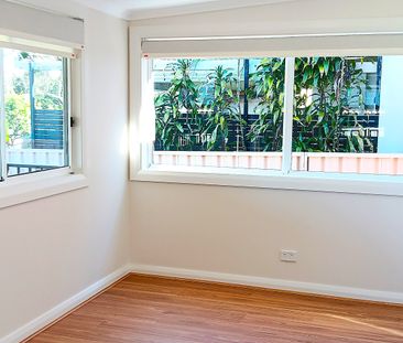 Fully & Extensively Renovated 3 Bedroom Brick Home - Like New inside - Photo 6