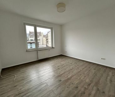 Zentral gelegene 2,5-Zimmerwohnung mit Balkon - Foto 4