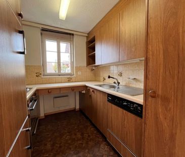 well-maintained 2-room apartment with lake and mountain views - Photo 5