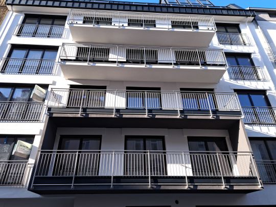 2 Zimmer mit Balkon, Erdwärme und Solaranlage. Ruhige Hoflage. 2023 erbaut. - Foto 1