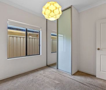 “Modern Family Home with Versatile Layout and Spacious Backyard” - Photo 6