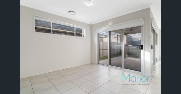 Double storey, modern family home - Photo 1