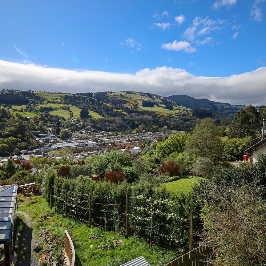Modern, Sunny 4-Bedroom Home with Stunning Views! - Photo 1