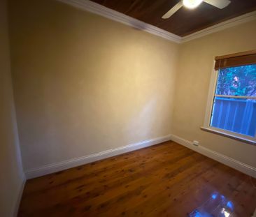 Stylish Central Living Just Moments from Everything - Photo 1