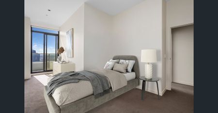 Sky-high three-bedroom residence with panoramic city and water views. - Photo 3