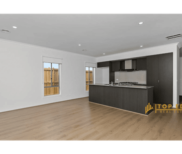 Family Home with Modern Comforts and Easy Maintenance - Photo 5