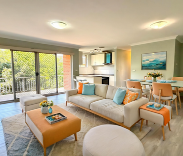 OVERSIZED 2 BEDROOM APARTMENT WITH LOCK UP GARAGE - Photo 2