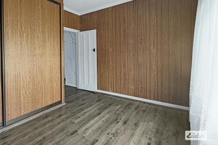 THREE-BEDROOM HOME WITH GARAGE - Photo 5