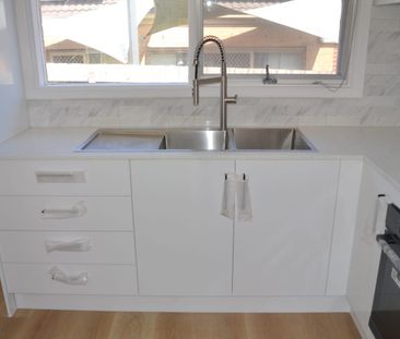 QUIET & MODERN LIVING IN NOBLE PARK CENTRAL - Photo 4