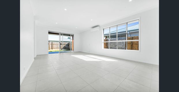 Look no further! This 4-bedroom home is waiting for the perfect family! - Photo 1