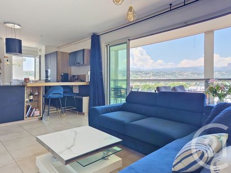Location Appartement 4 pièces 74m² NICE 06200 - Photo 2