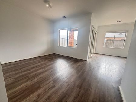 Modern Comforts Await in This 4-Bedroom, 2-Bathroom Home - Photo 4