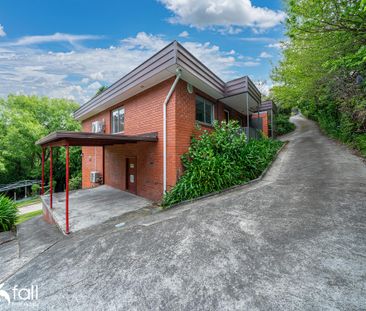 Modern, low maintenance city fringe living - Photo 6