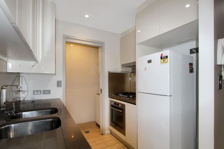 Fully Furnished One Bedroom Apartment with Parking and Study - Photo 5