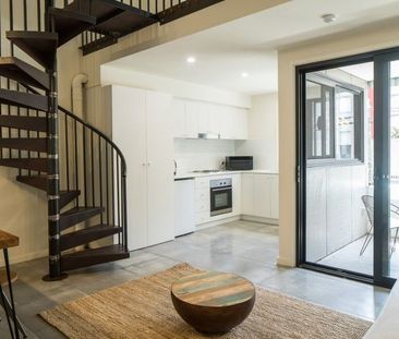 THE GLASS STUDIOS are sleek industrial living and are located in th... - Photo 3