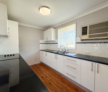 Peaceful Suburban Living in a Central, Well-Connected Location - Photo 6