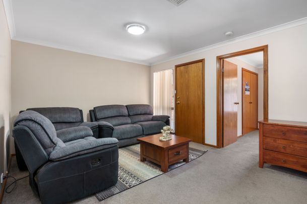 Neat, Tidy & Centrally Located – The Perfect Low-Maintenance Home - Photo 1