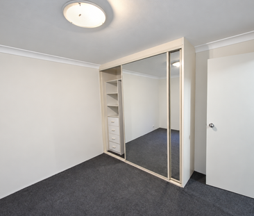 Spacious Two-Bedroom Apartment with Balcony & Two Car Spaces - Photo 6