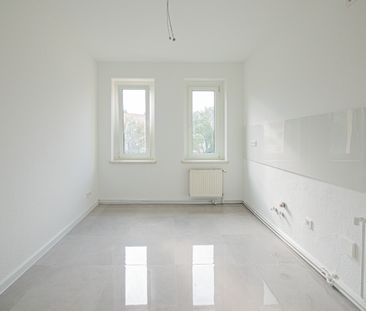 Ihr neues, saniertes Zuhause im kleinen Mehrfamilienhaus in ruhiger Seitenstraße. - Photo 1