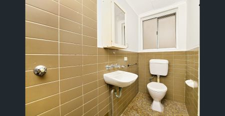 Conveniently Located with a Lock-Up Garage - Photo 4