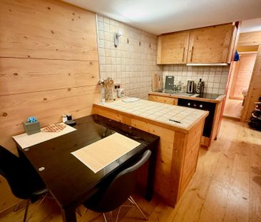 Gemütliche Wohnung mit viel Holz und alpinem Charm - Foto 3