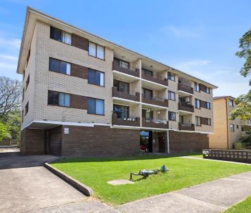 “Freshly Updated Apartment with Lock-Up Garage in a Convenient Loca... - Photo 1