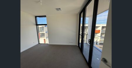 Experience Contemporary Living in This Stylish Three-Story Townhouse - Photo 5