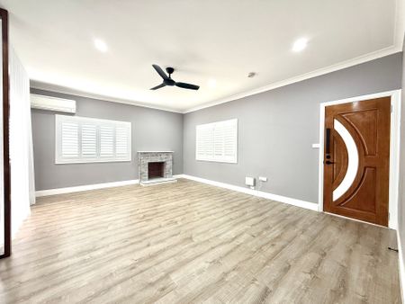 Fully Renovated Three-Bedroom Home with Carport Parking - Photo 3