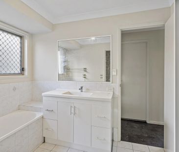 Four bedroom home with air conditioning on large block.. - Photo 1