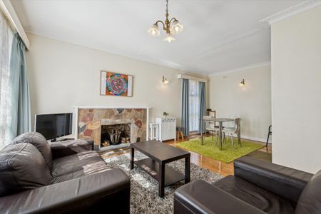 Comfortable Brick Home with Flexible Layout - Photo 2