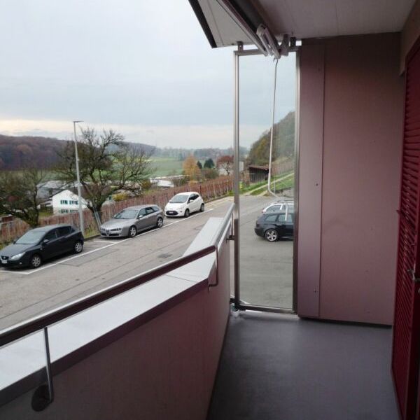 Appartement de 3.5 pièces au 1er étage avec balcon - Photo 1