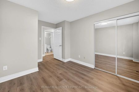 5035 Oscar Peterson Boulevard #105 - Photo 2