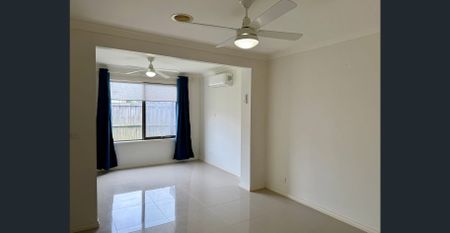 Spacious 4 Bed | 4 Bath Family Home in Prime Truganina Location - Photo 5