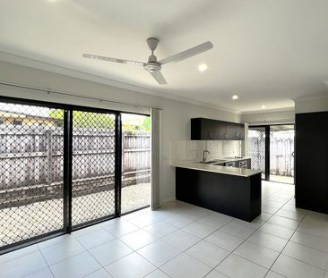 Spacious 3-Bedroom Unit with Fenced Courtyard - Photo 1