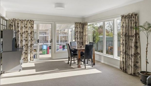 Sunny Family Home in Popular Location - Photo 1